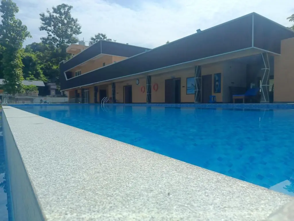 Clear blue water along the length of the pool